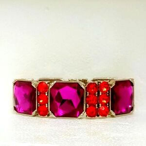 Vintage-Inspired Silver Band Bracelet with Red and Purple Gemstones